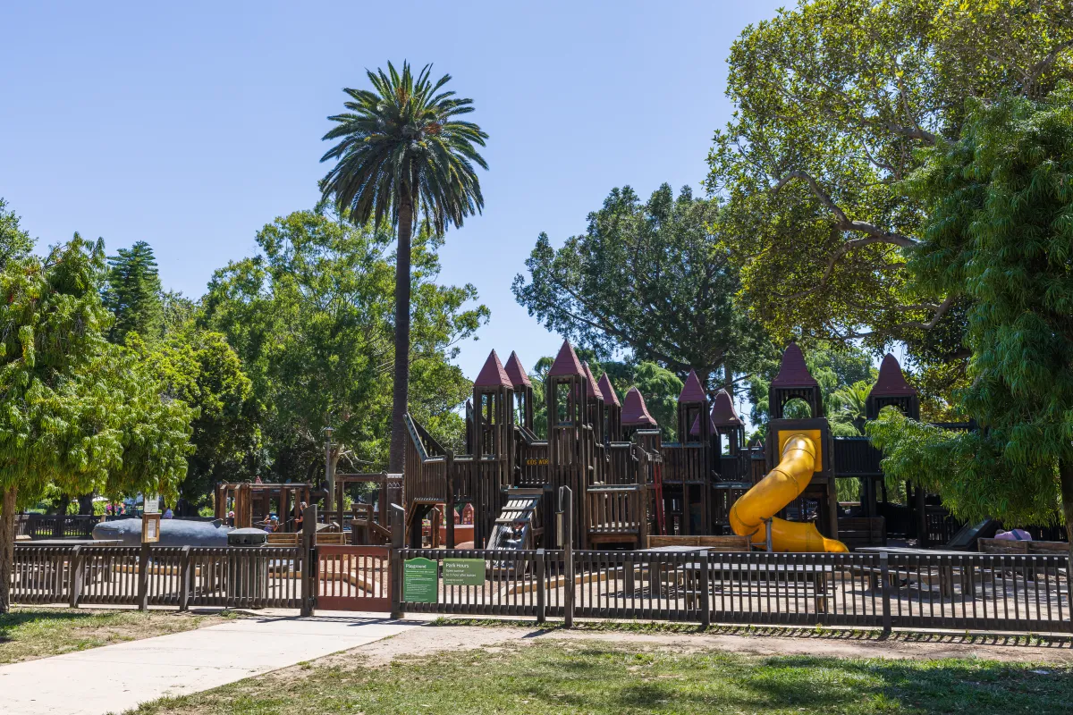 Kids' World Playground in Alameda Park, Santa Barbara - a large wooden play structure for children